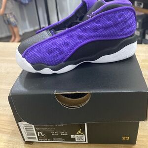 Purple and black and white Jordan